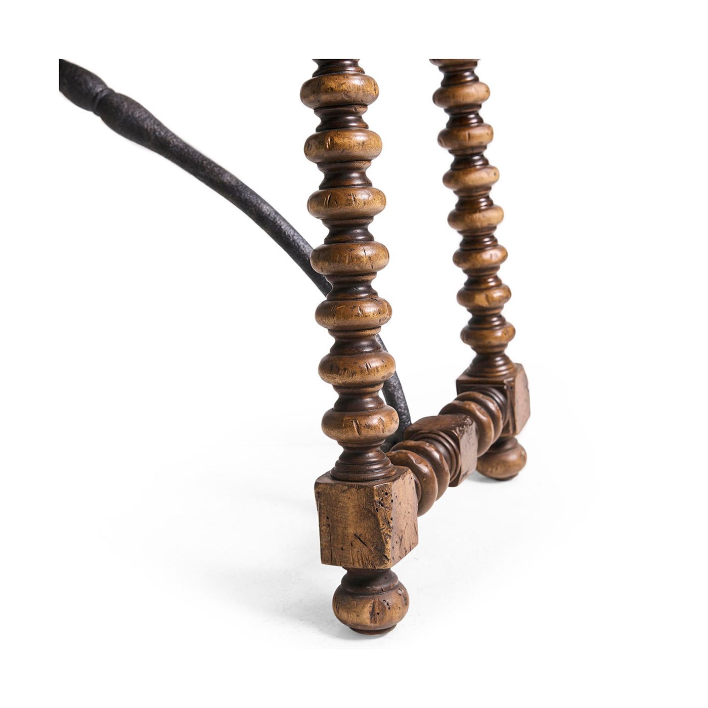 Close detail spool leg of farmhouse console table base.