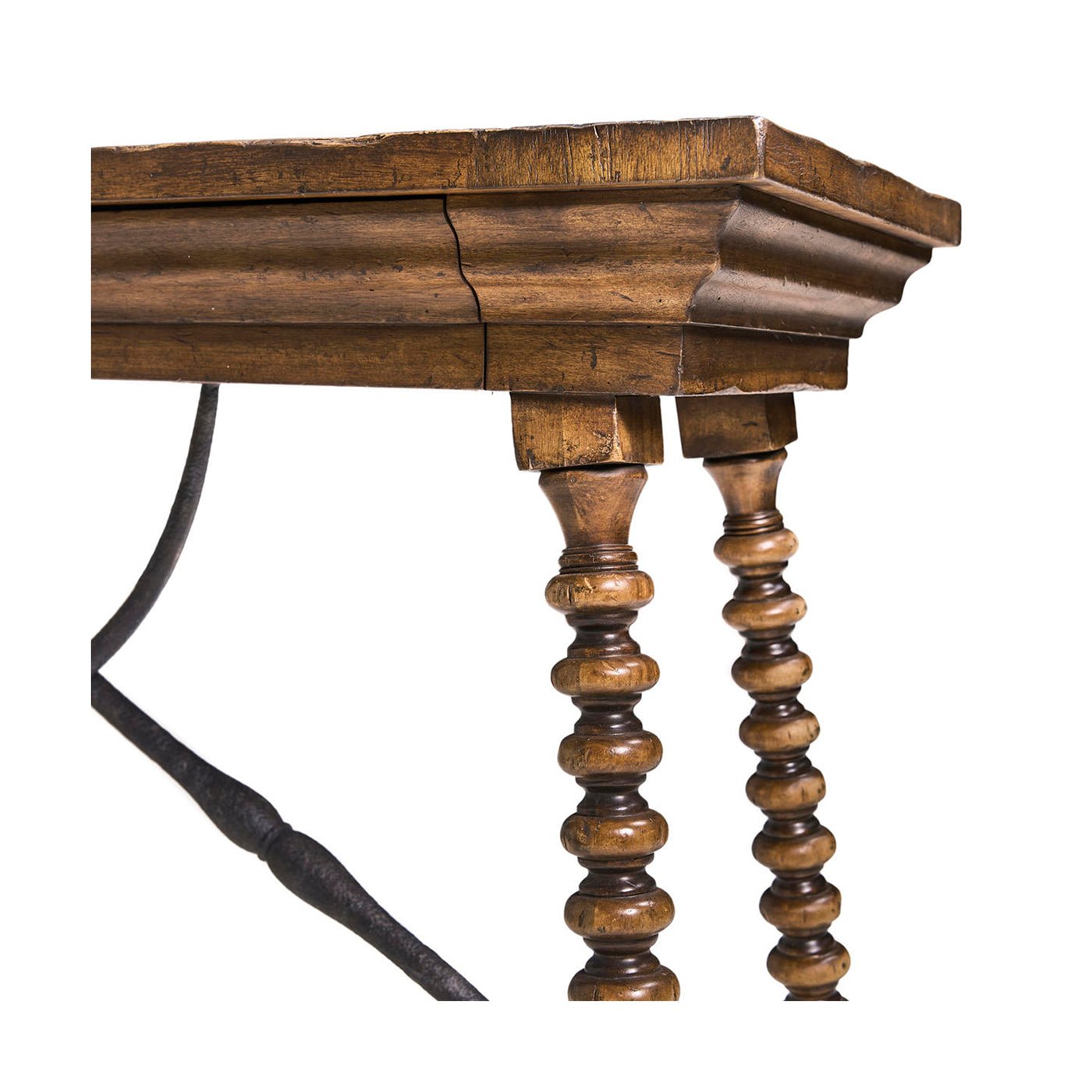 Close-up of console table corner, focus on wood detail.