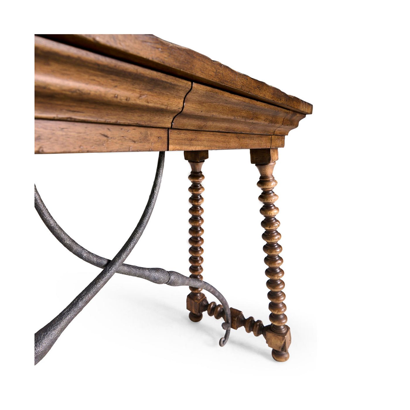 Close-up console table base, metal support, spool legs.