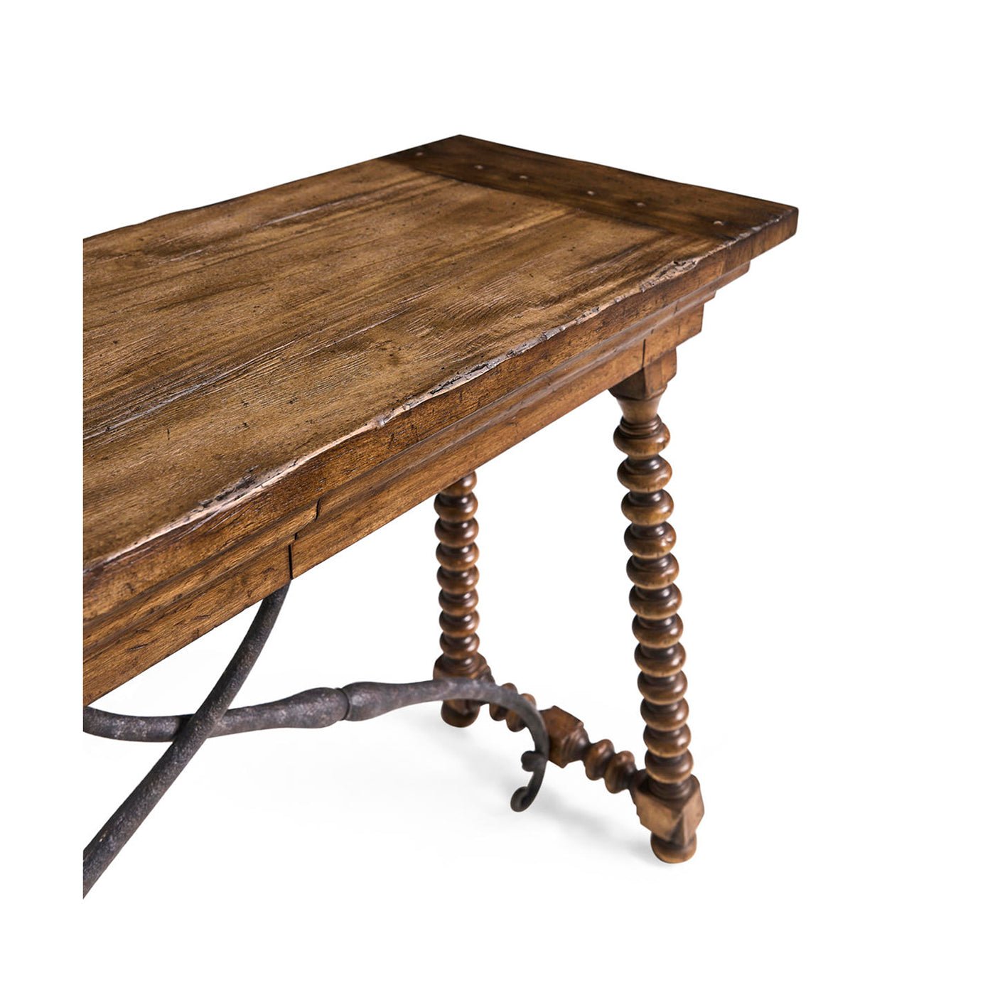 Corner detail of console table, spool legs, metal braces.