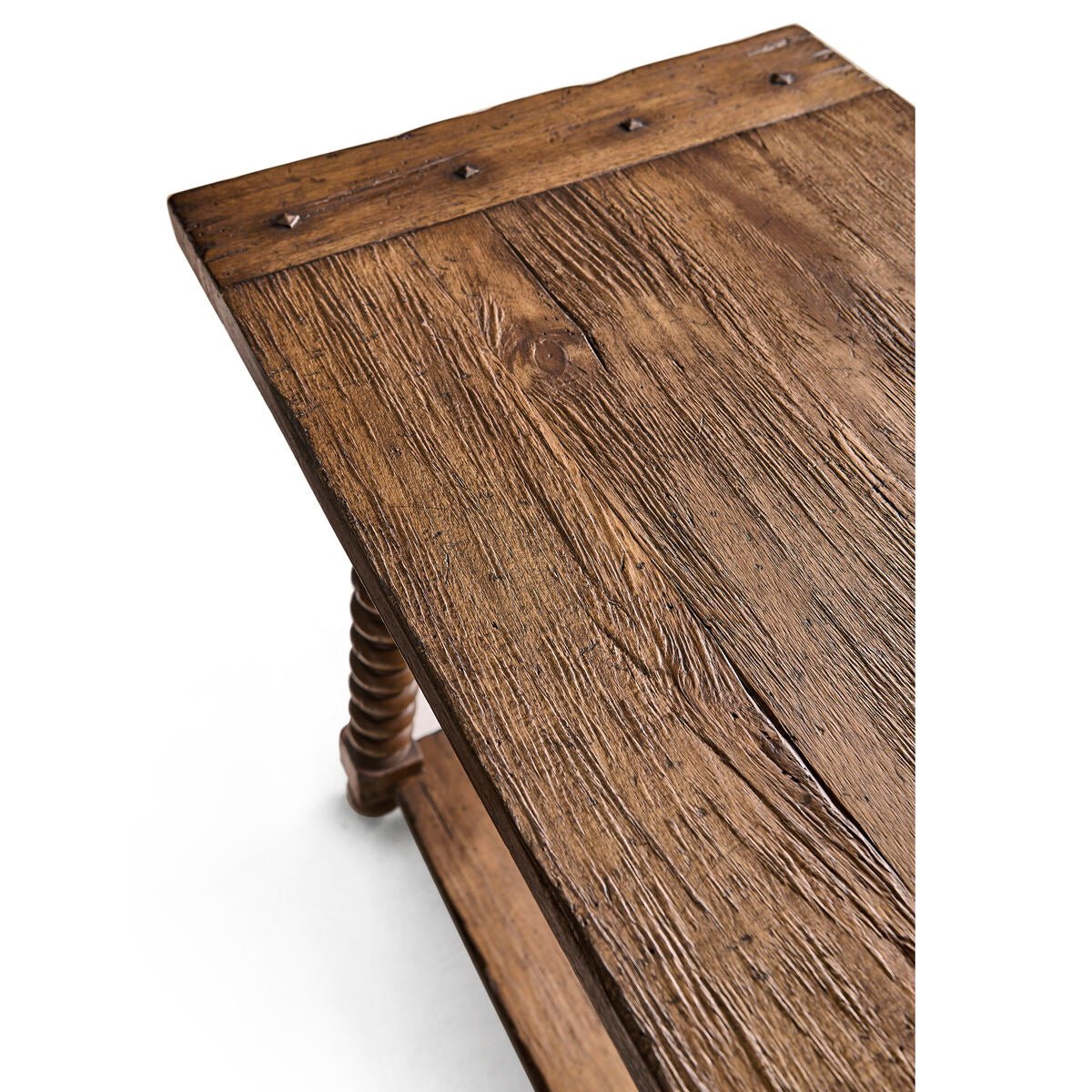 Close-up of rustic wooden texture on end table.