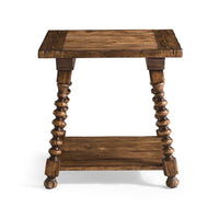Front view of rustic spool-leg side table.