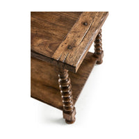Corner view showing spool legs, rustic side table.