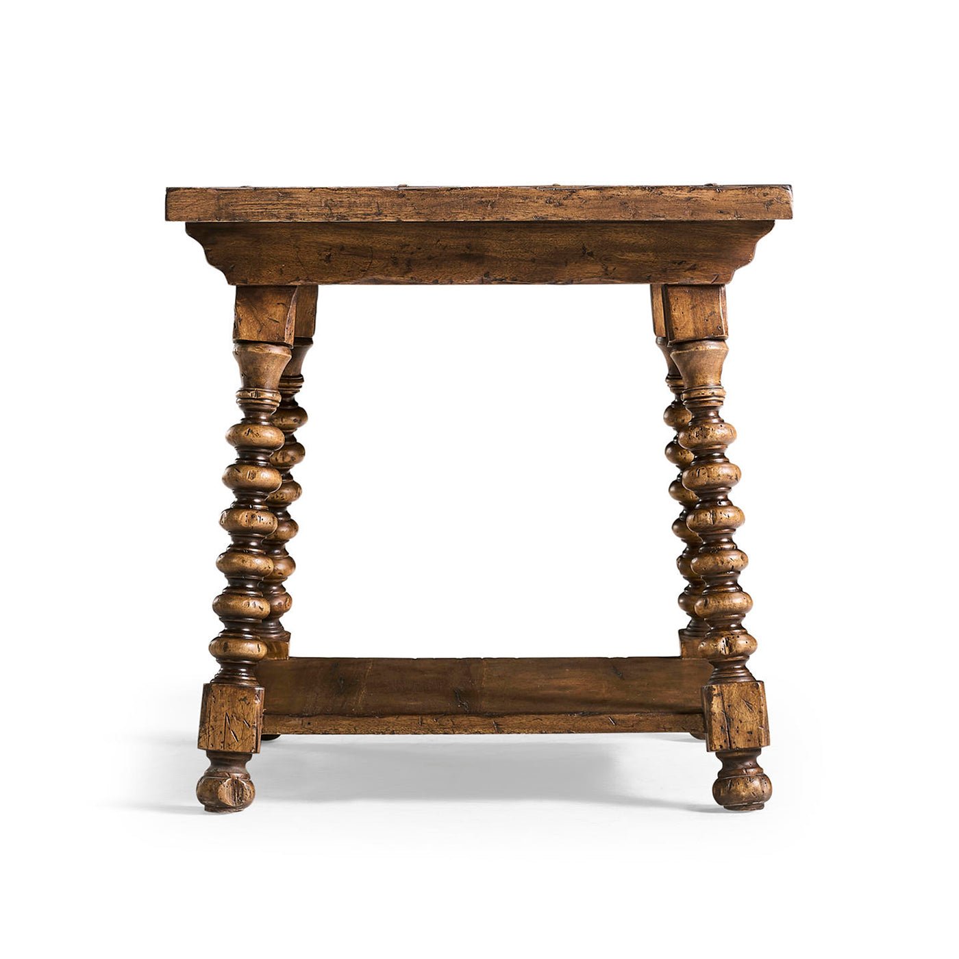Side view of rustic farmhouse spool-leg side table.
