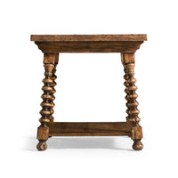 Side view of rustic farmhouse spool-leg side table.
