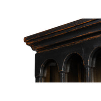 Rustic bookcase top edge molding detail.