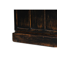 Rustic bookcase bottom panel texture detail.