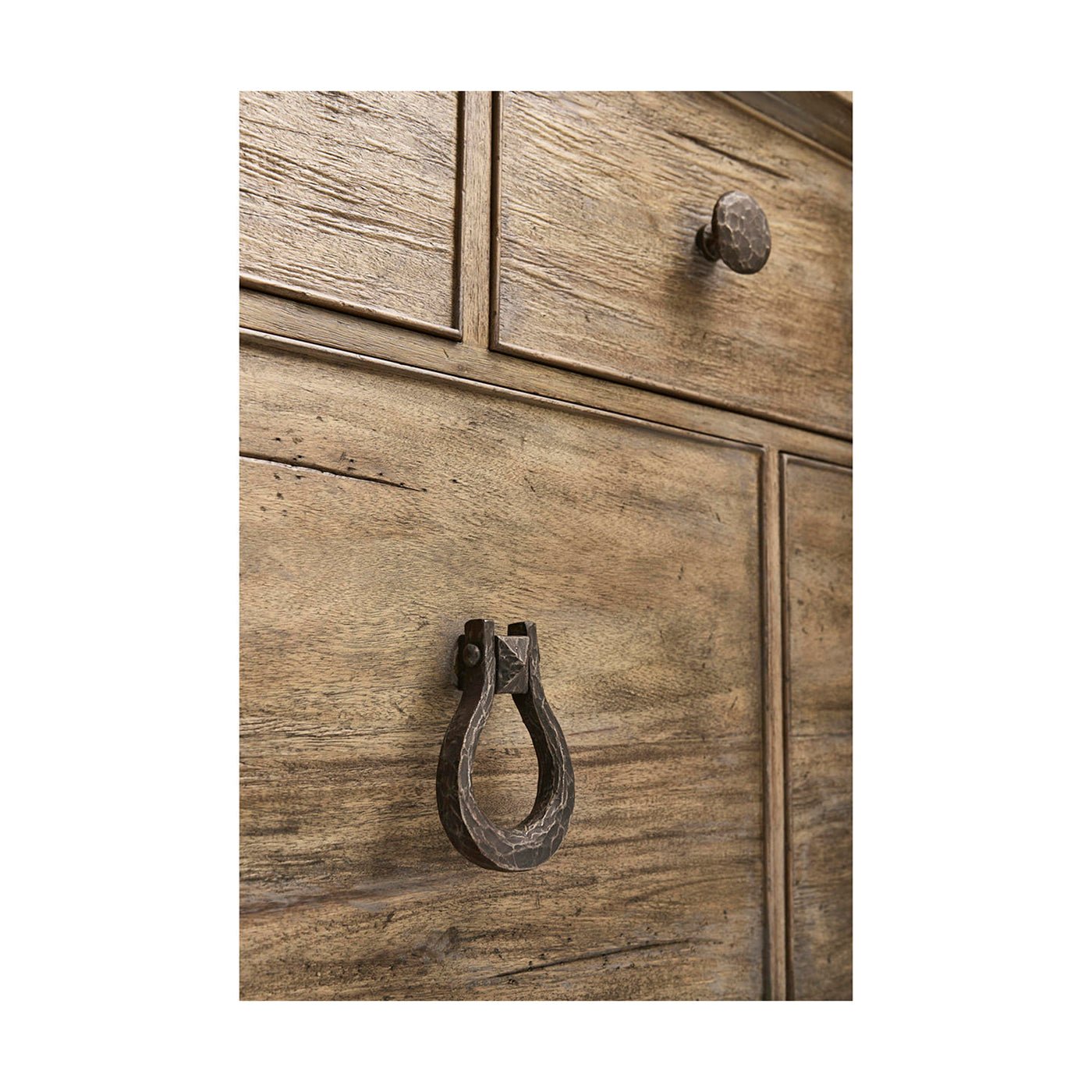 Close-up of handle on bottom drawer of dresser.