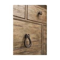 Close-up of handle on bottom drawer of dresser.