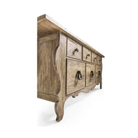 Angle view of farmhouse dresser showing drawer details.