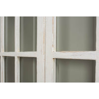 Rustic whitewashed bookcase, close-up window panel detail.