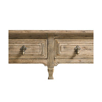 Close-up of drawers on rustic console table.