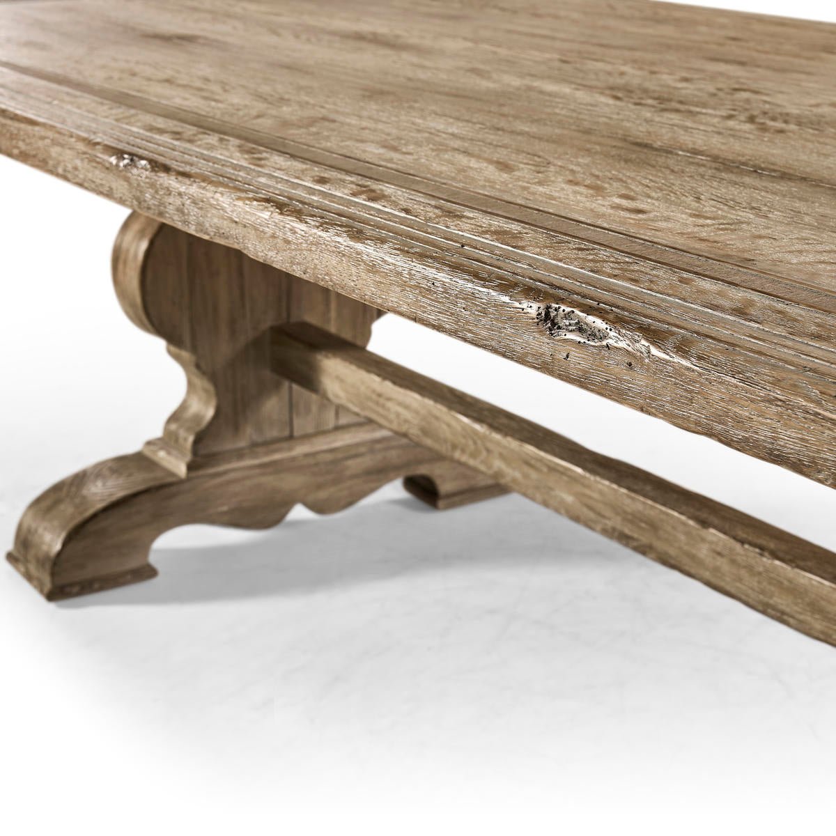 Close-up of trestle base and table surface.