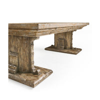 Rustic coffee table with trestle base detail.