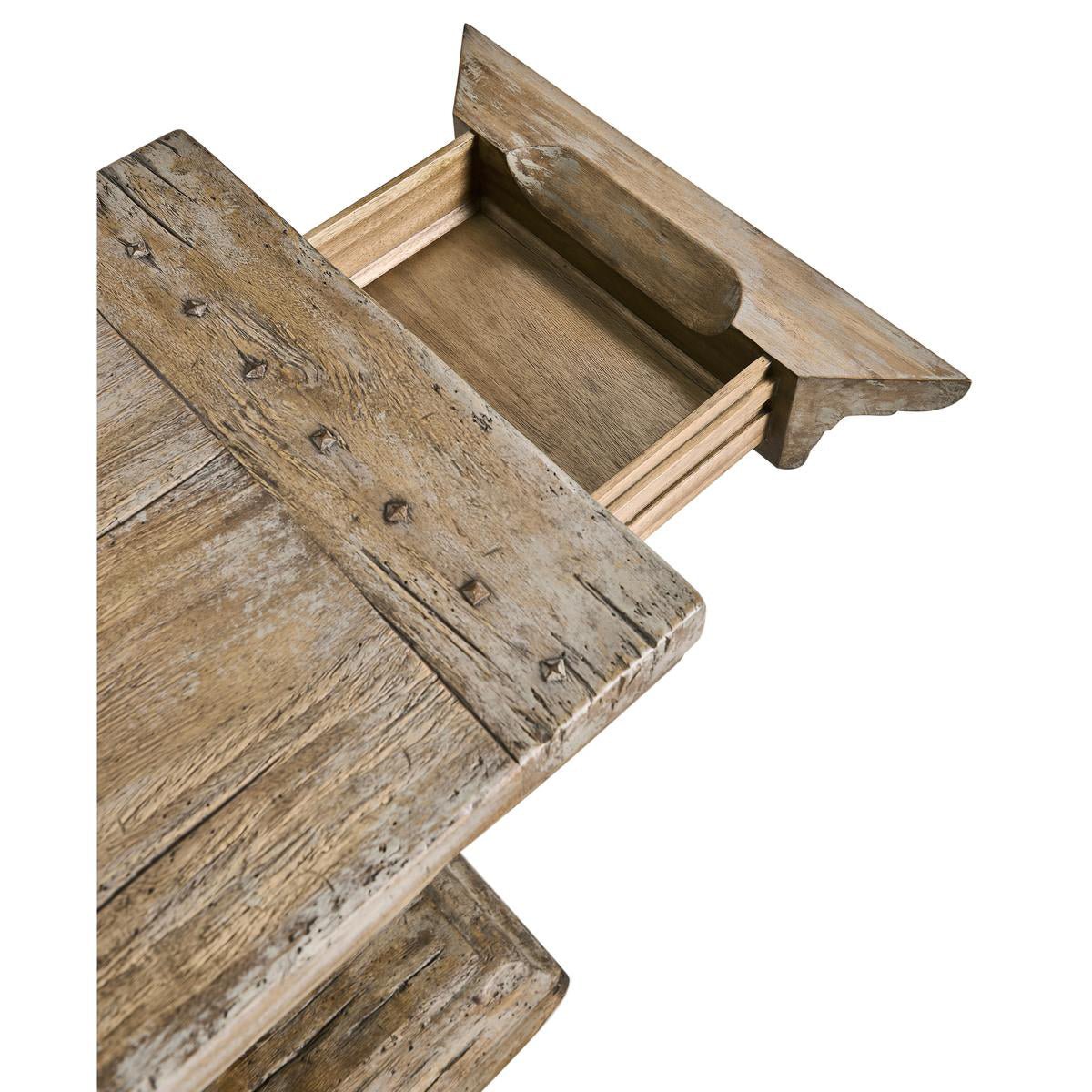 Close-up of open drawer in rustic wood side table.