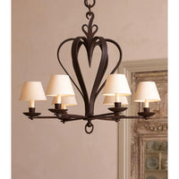 Rustic chandelier with cream shades, classic French style.