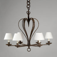 Close-up of chandelier's heart-shaped frame, elegant design.