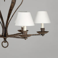 Side view of chandelier lights, rustic metal finish.