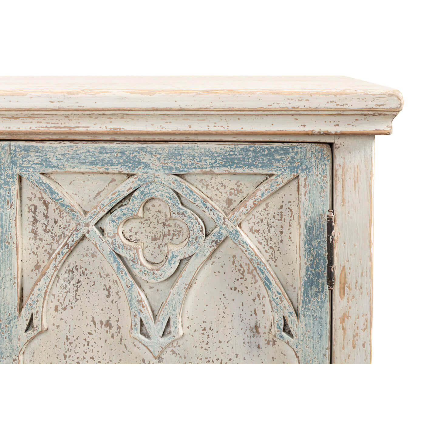 Rustic French Gothic cabinet, detailed door design close-up.