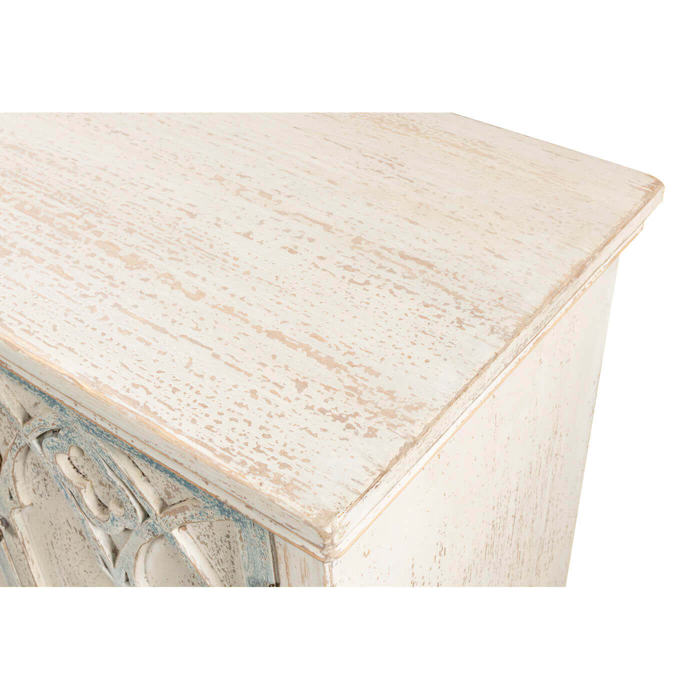 Rustic French Gothic cabinet, detailed top corner texture.