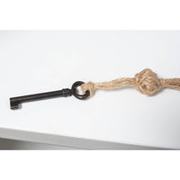 Vintage key with rope for rustic grey painted bookcase
