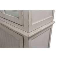 Close-up corner detail of rustic grey painted bookcase