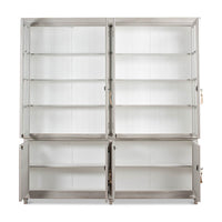 Open rustic grey painted bookcase showing interior shelves