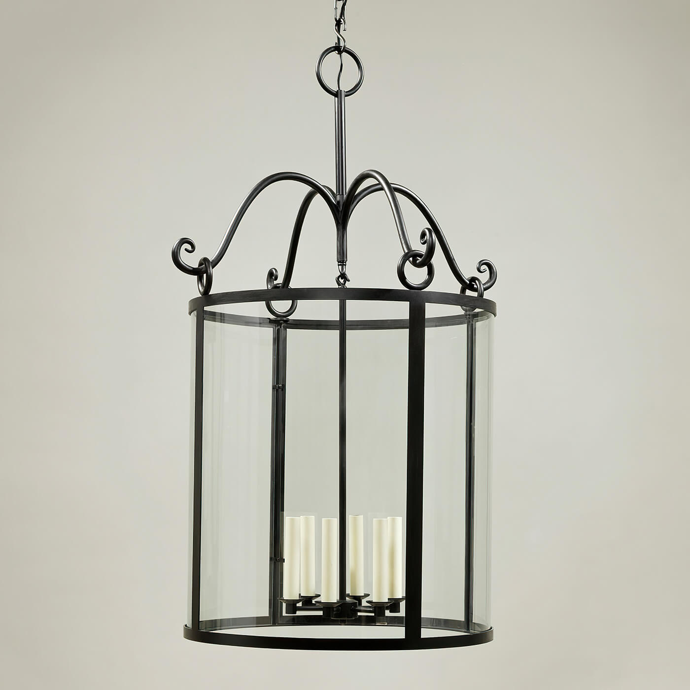 Rustic hall lantern with candles, clear side view.
