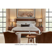 Rustic oak bedroom scene with darker finish nightstands.