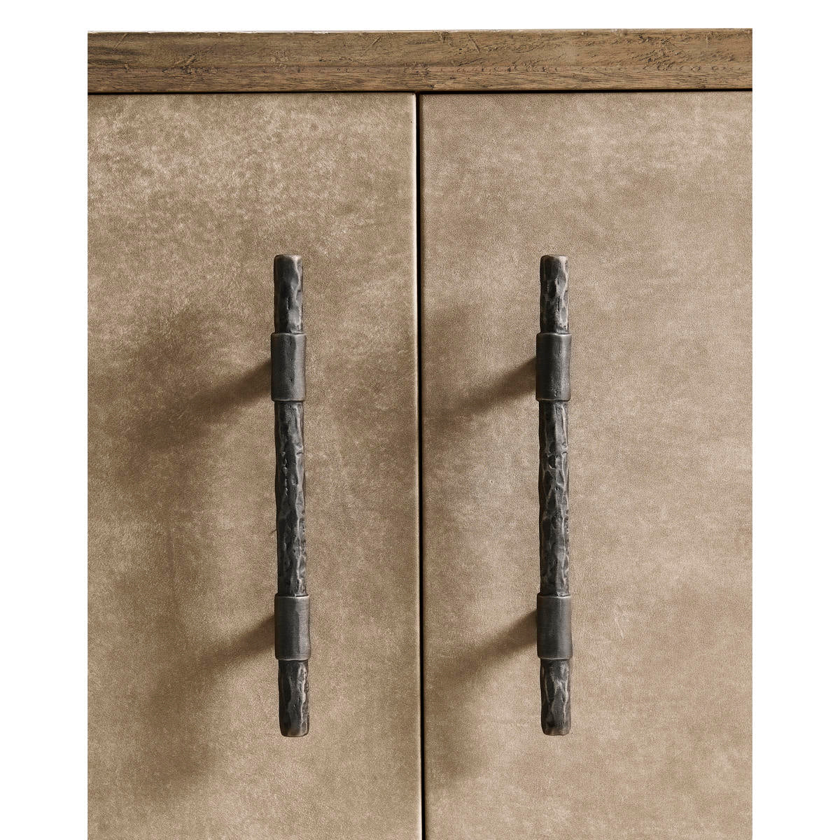Close-up of credenza handles, detailed texture.