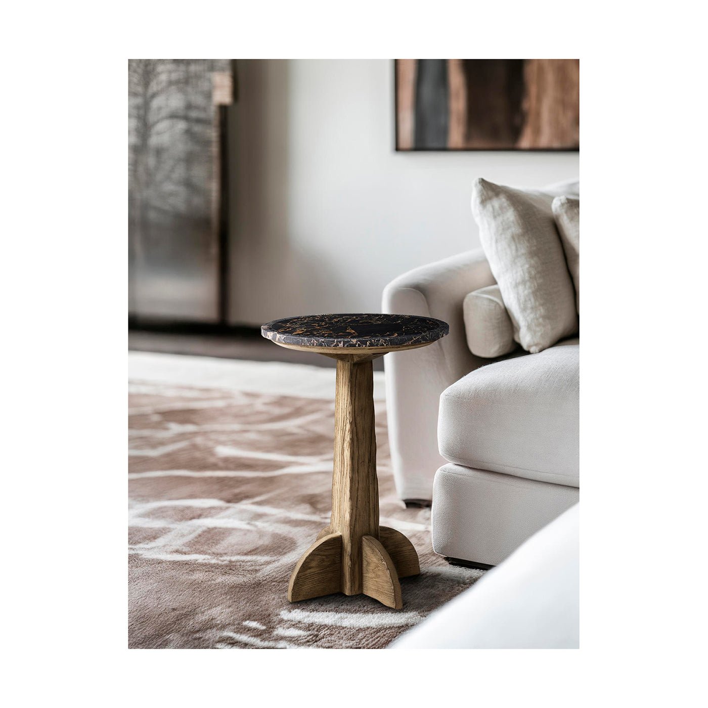 Marble top table next to white sofa in living room.