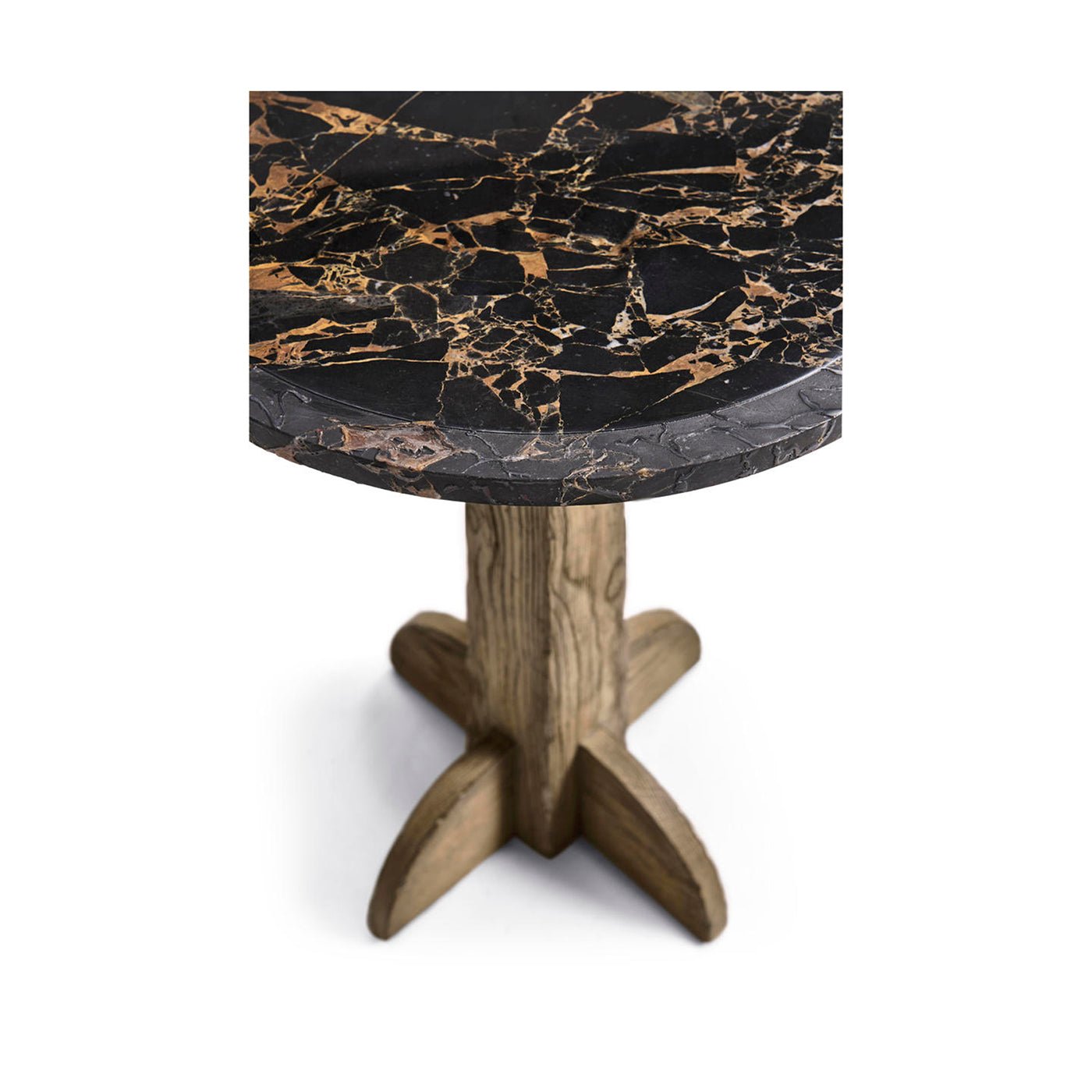 Close-up of table surface and wooden base connection.