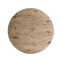 Top-down view of rustic round dining table surface.
