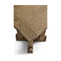 Corner detail of rustic modern table with nail accents.
