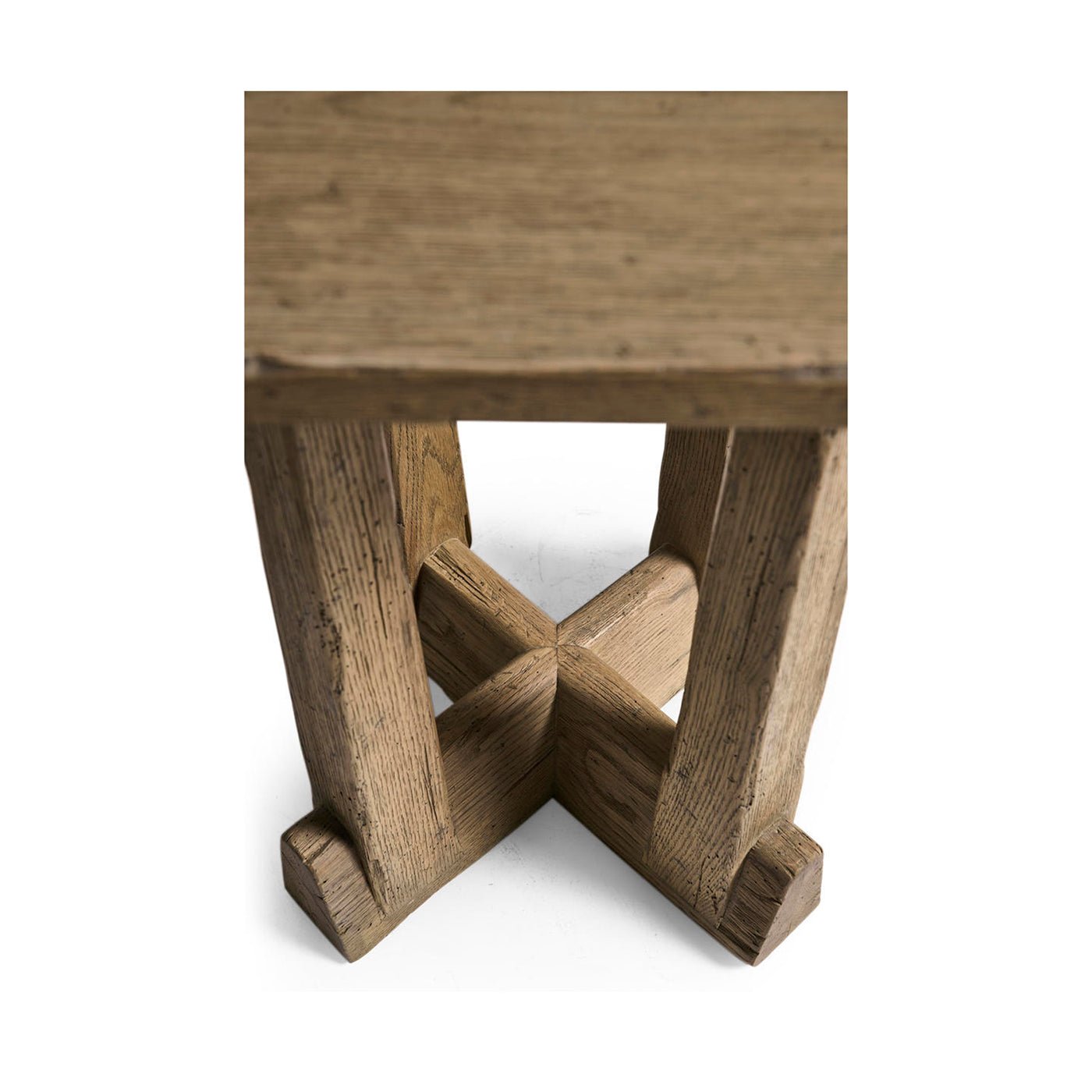 Overhead view of rustic table cross base design.