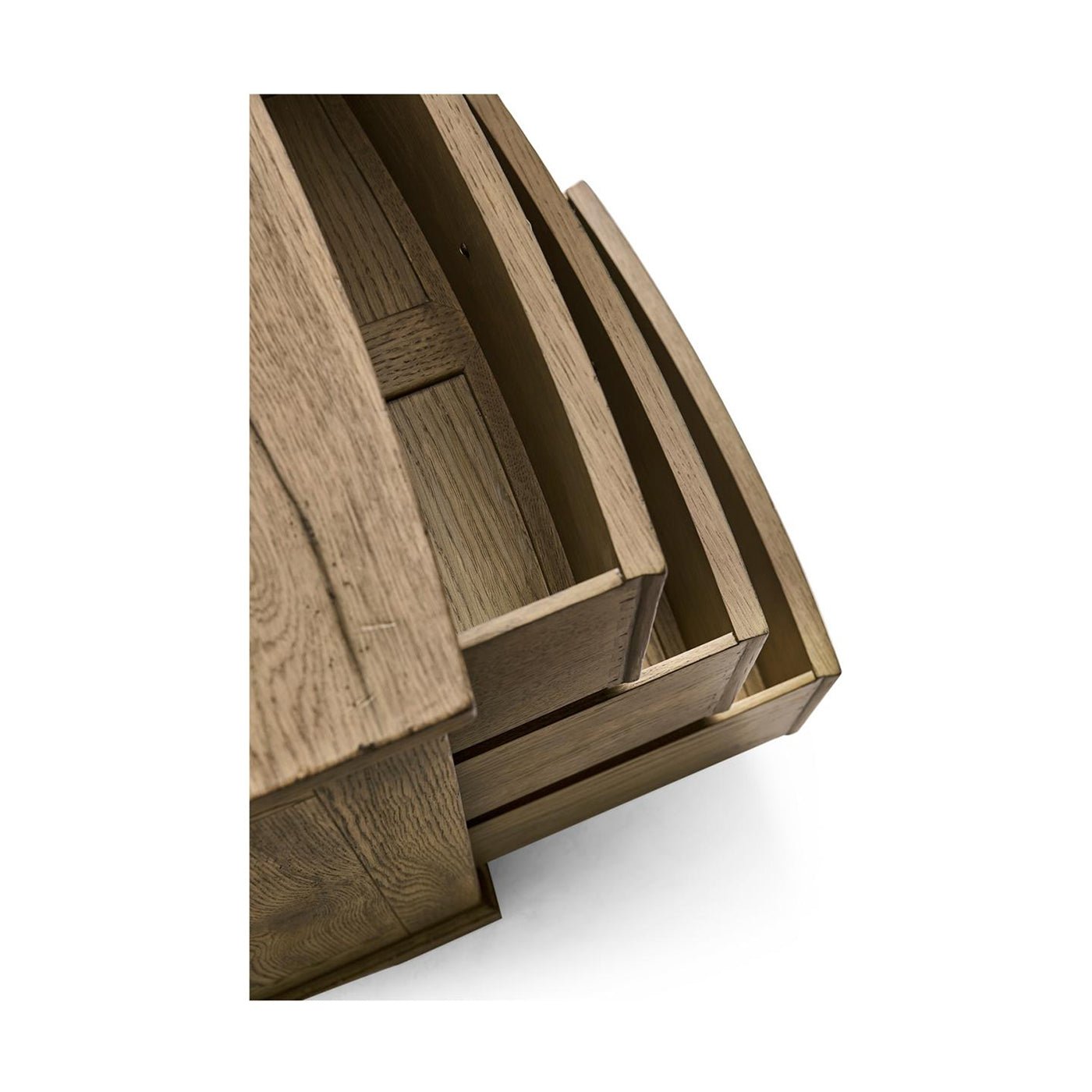Rustic modern nightstand, partially open drawers from above.