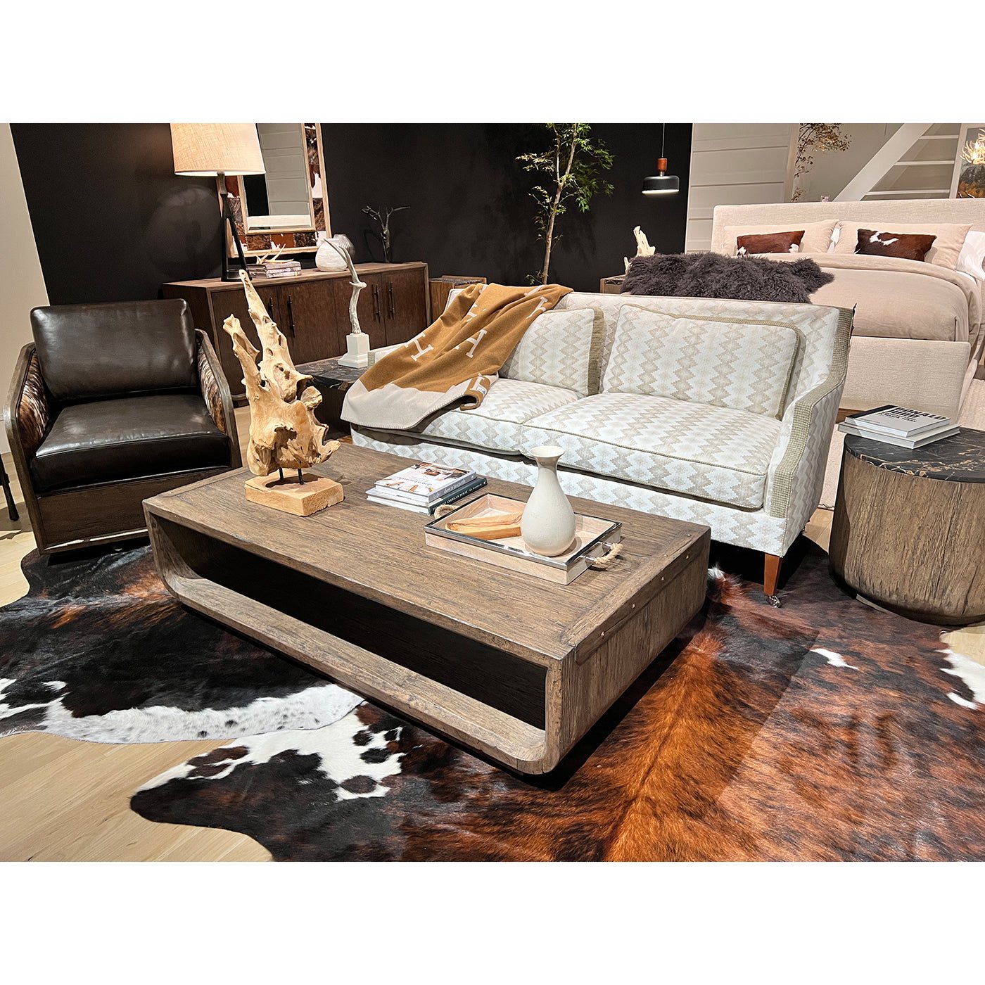 Rustic table in cozy living room setup with seating.