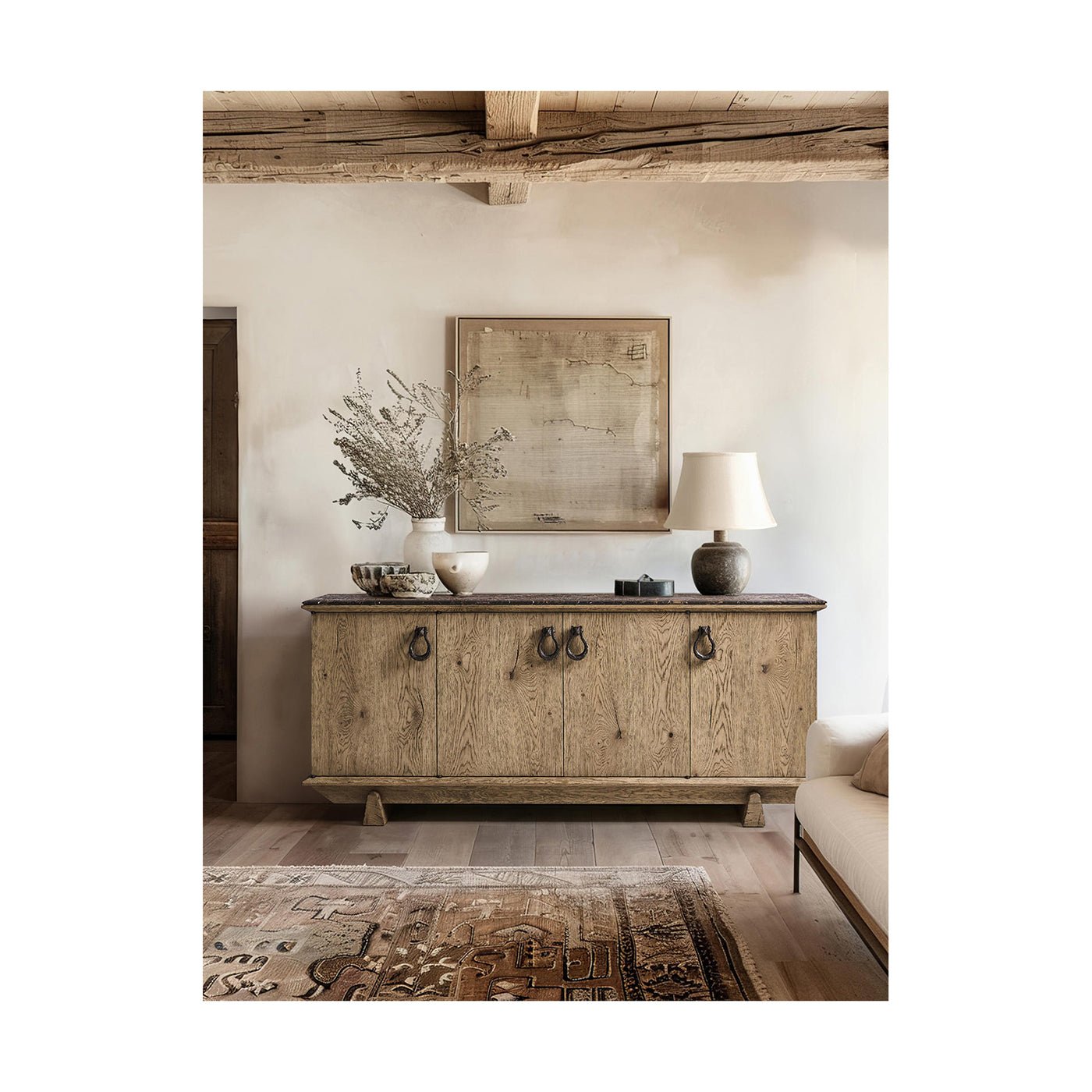 Rustic buffet in room setting with decor items.