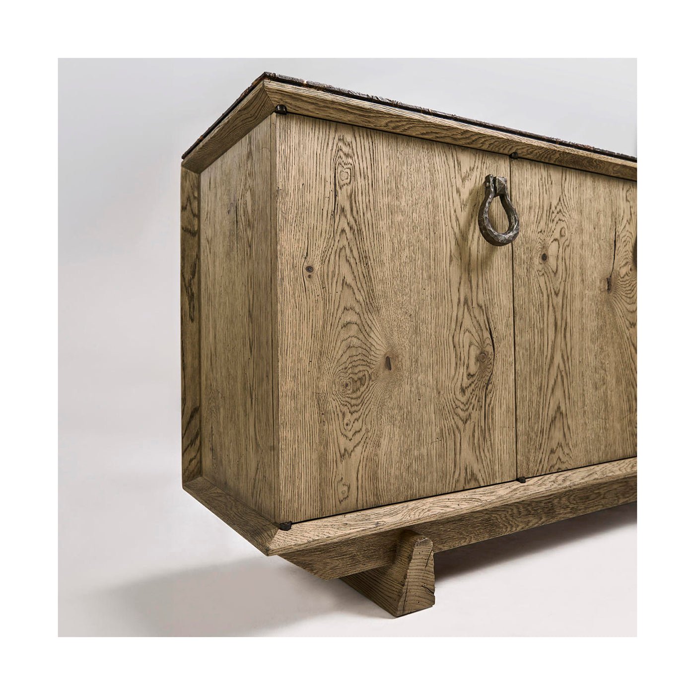Side angle of rustic oak buffet.