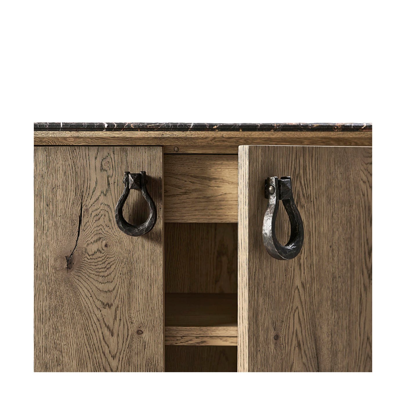 Rustic buffet door partially open revealing interior.