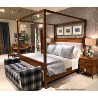 Room setup with rustic oak canopy bed, darker finish.