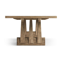 Rustic oak dining table, end view highlighting base design.
