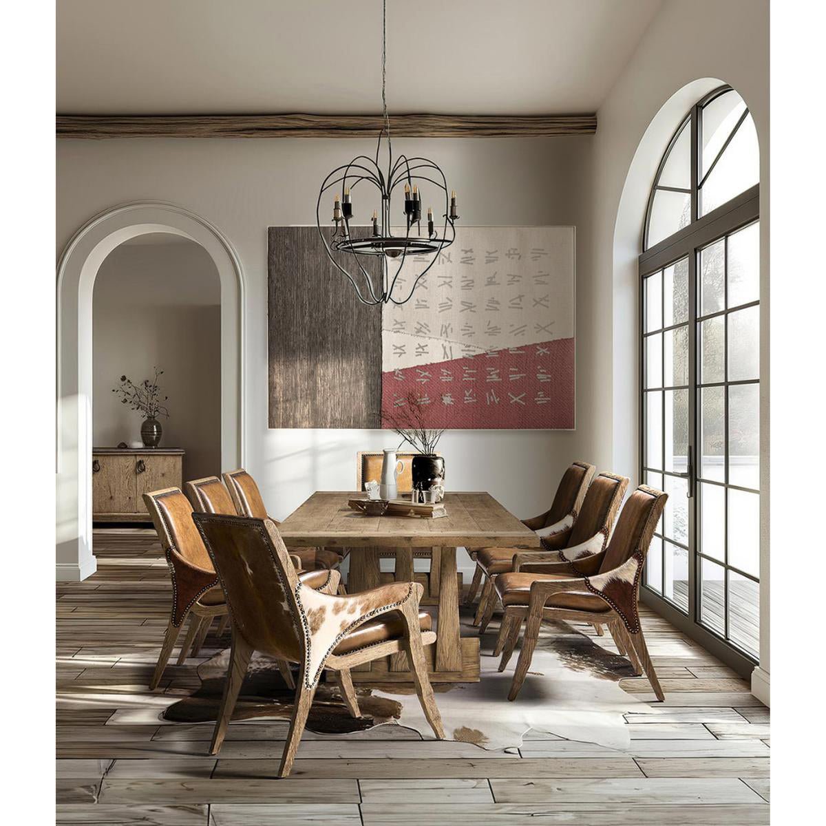 Dining room with rustic oak table, artistic wall decor.
