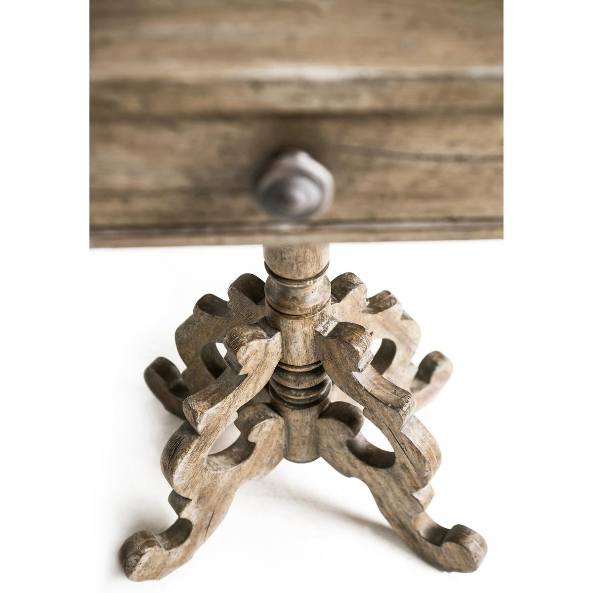 Rustic oak pedestal side table, base detail, ornate carvings.