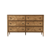 Front view of rustic oak parquetry dresser, drawers closed.