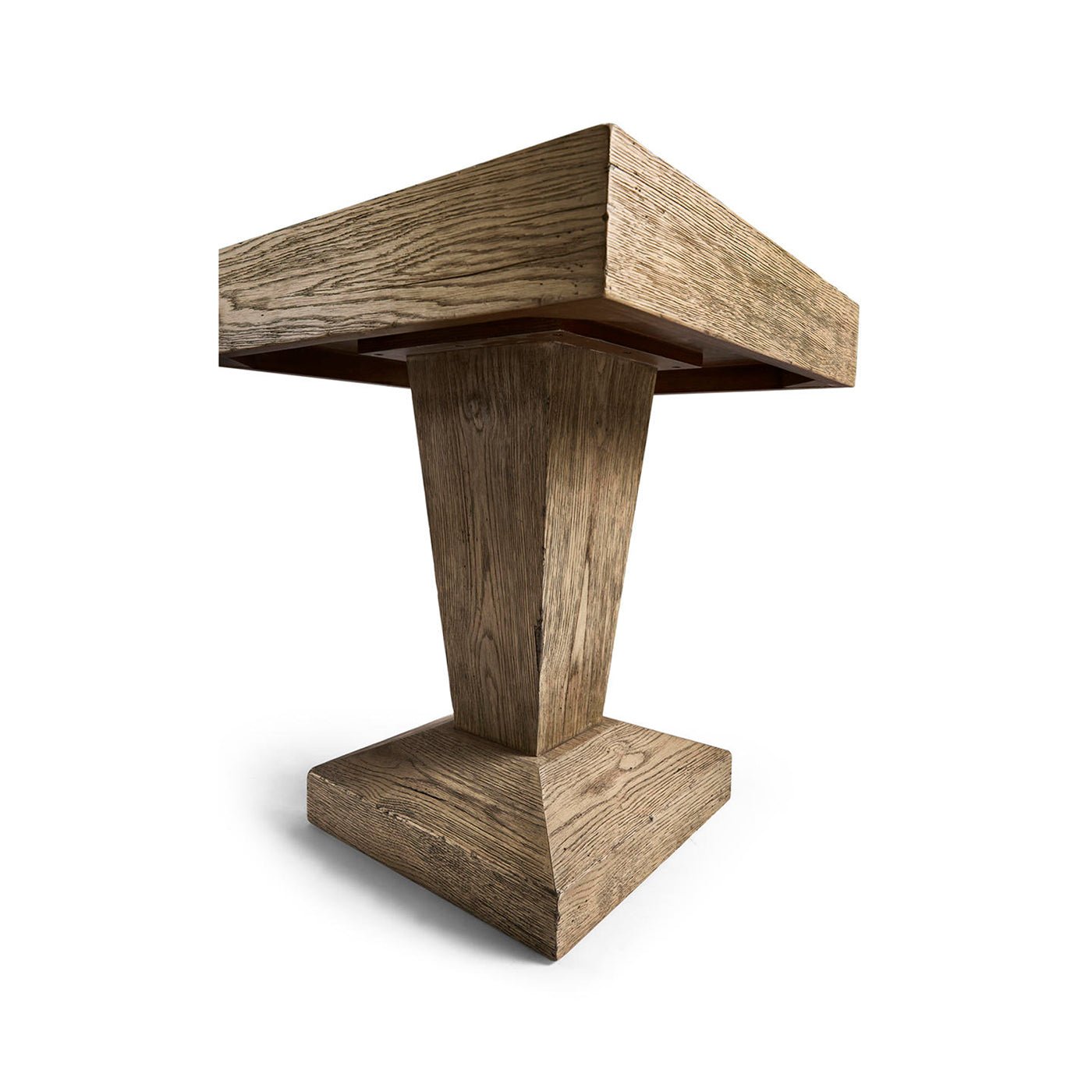 Low angle view of oak side table pedestal base.