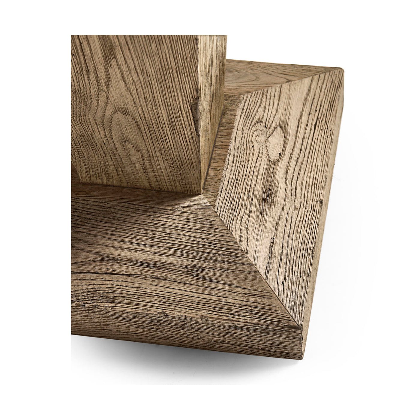Close-up of pedestal base detailing on oak side table.