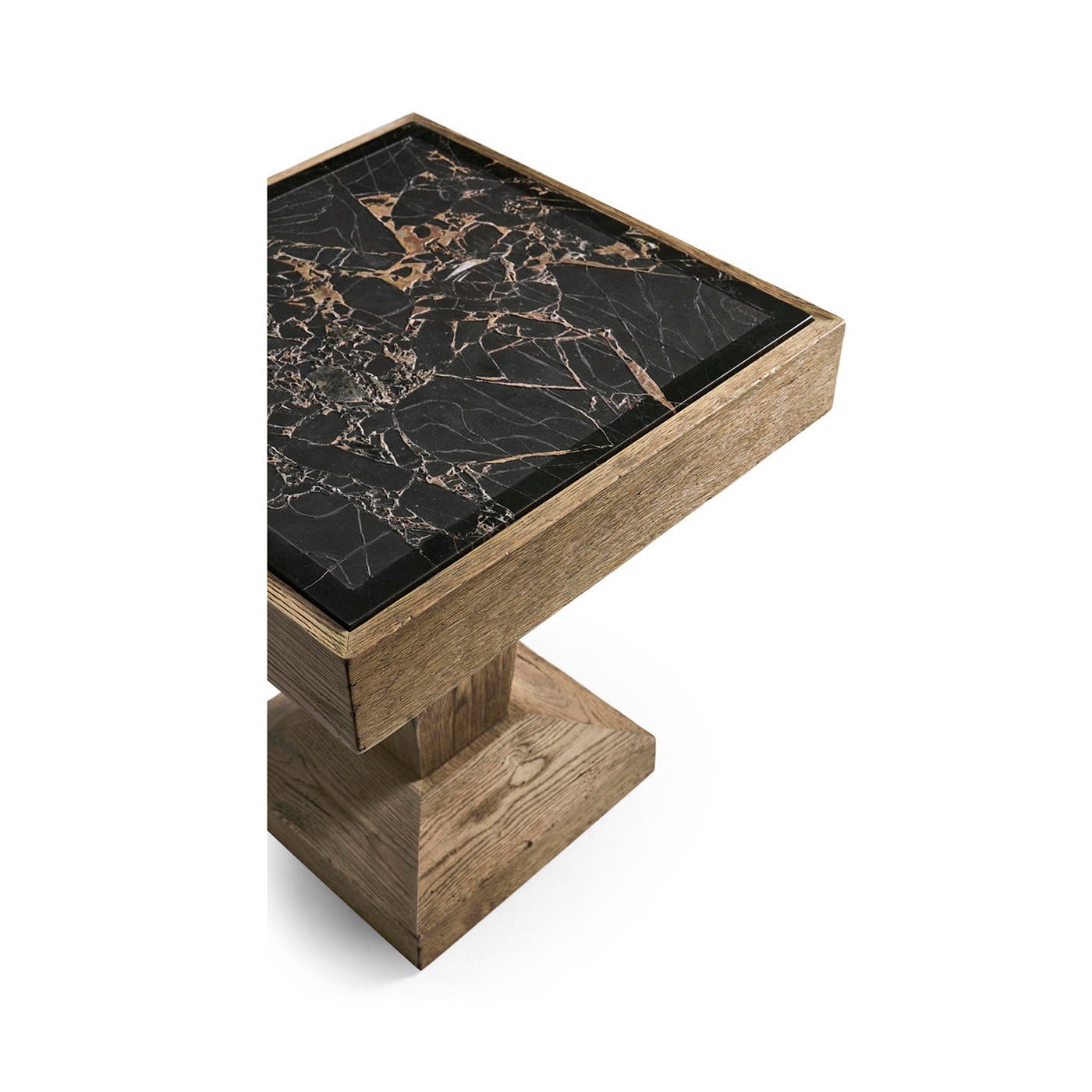 Close-up of stone top corner on oak side table.