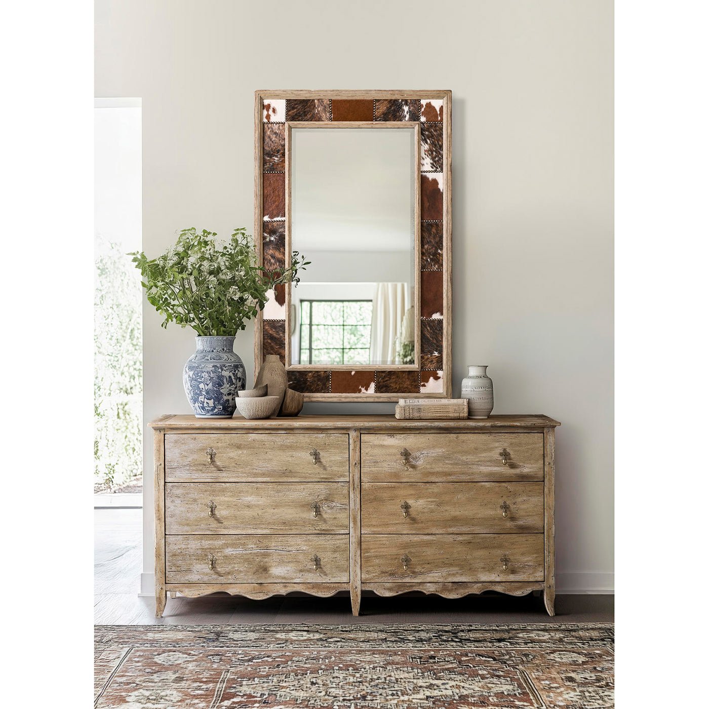 Rustic oak dresser, styled in living room setting.