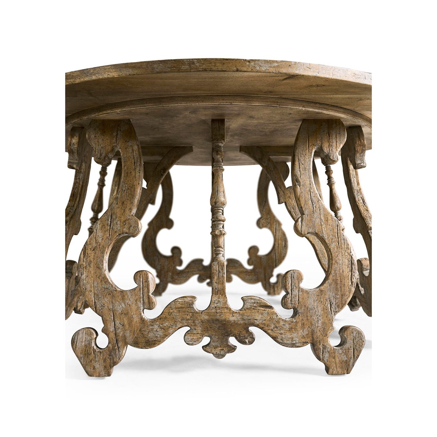 Underneath view showing intricate legs of center table.